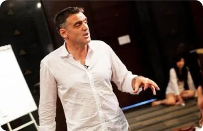 Pete talking with a group in a workshop